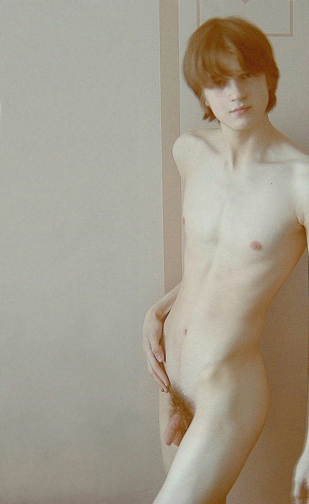 night photo of naked boy posing nude